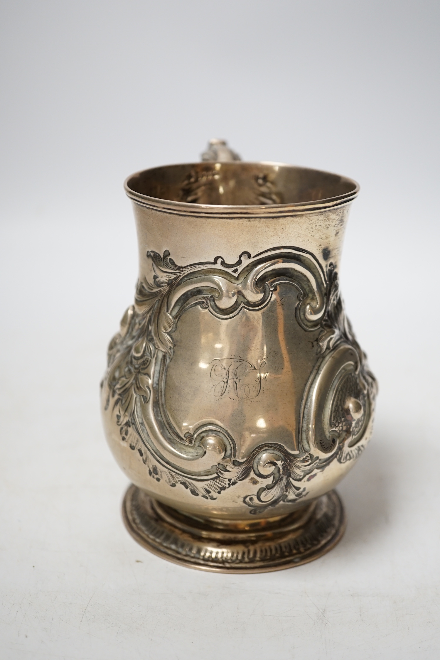 A Victorian embossed silver baluster mug, Charles Boyton II, London, 1866?, height 13cm, 8.6oz.